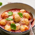 Cottage cheese gnudi in tomato sauce