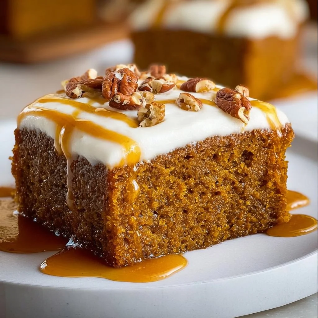 Delicious spiced cake with warm spices and frosting, a perfect fall dessert.