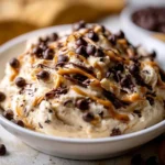 Delicious cookie dough dip served in a bowl with a spoon